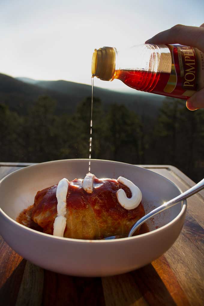 splashing red wine vinegar onto cabbage roll