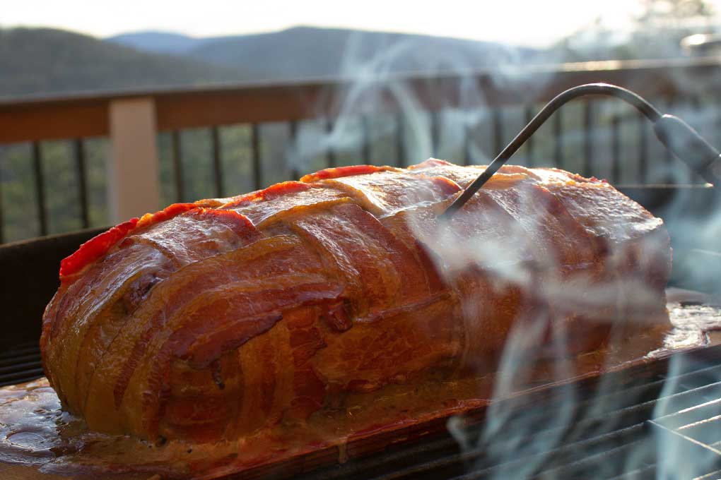 smoke kissing the meatloaf on the grill