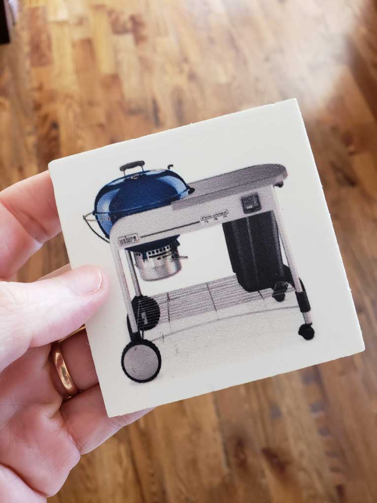 Weber grill magnet image on front