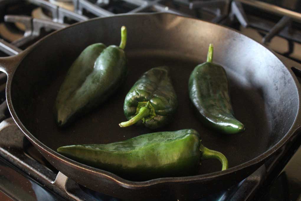 poblano peppers in pan