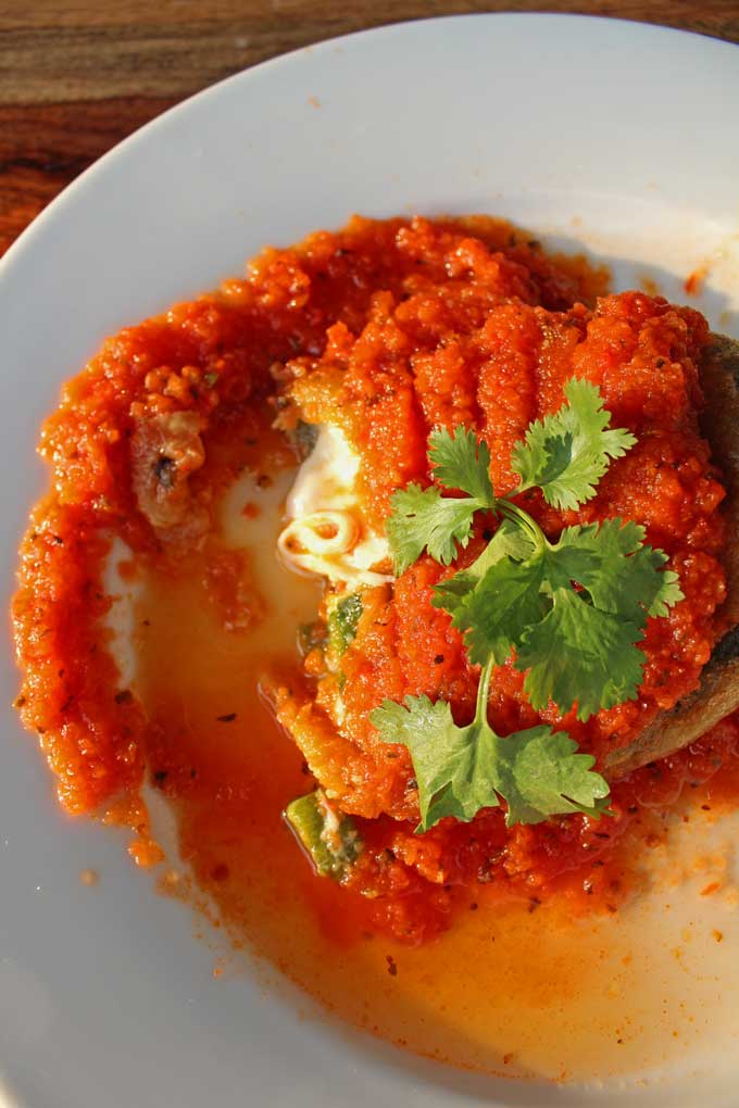authentic chiles rellenos on a plate ready to eat