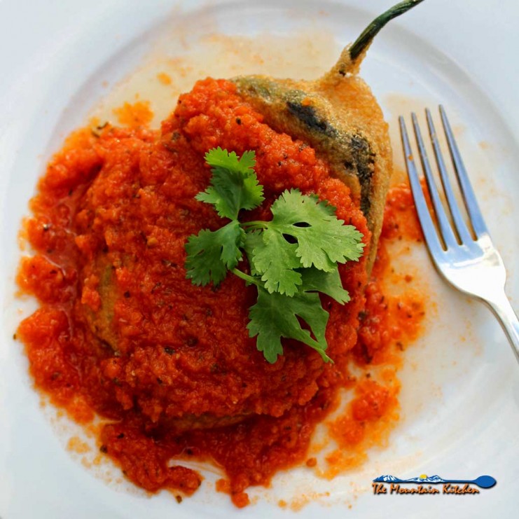 Authentic Chiles Rellenos on plate ready to eat