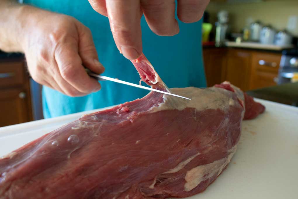 David trimming tenderloin