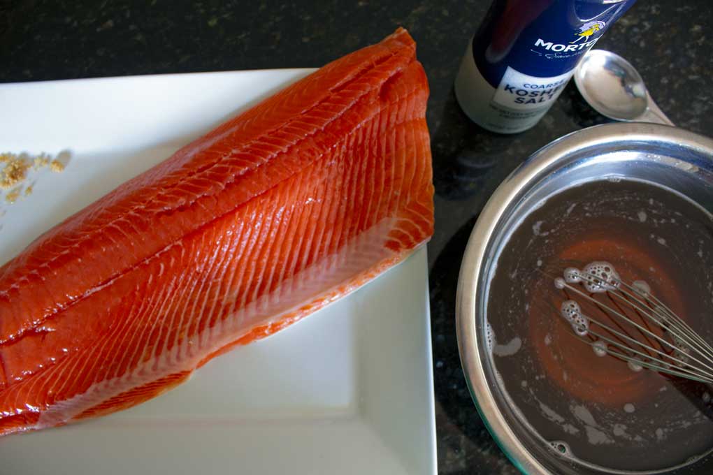 fillet of salmon with brine in bowl
