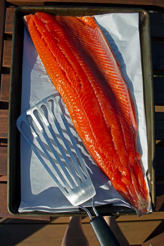 cured dried salmon fillet on sheet pan