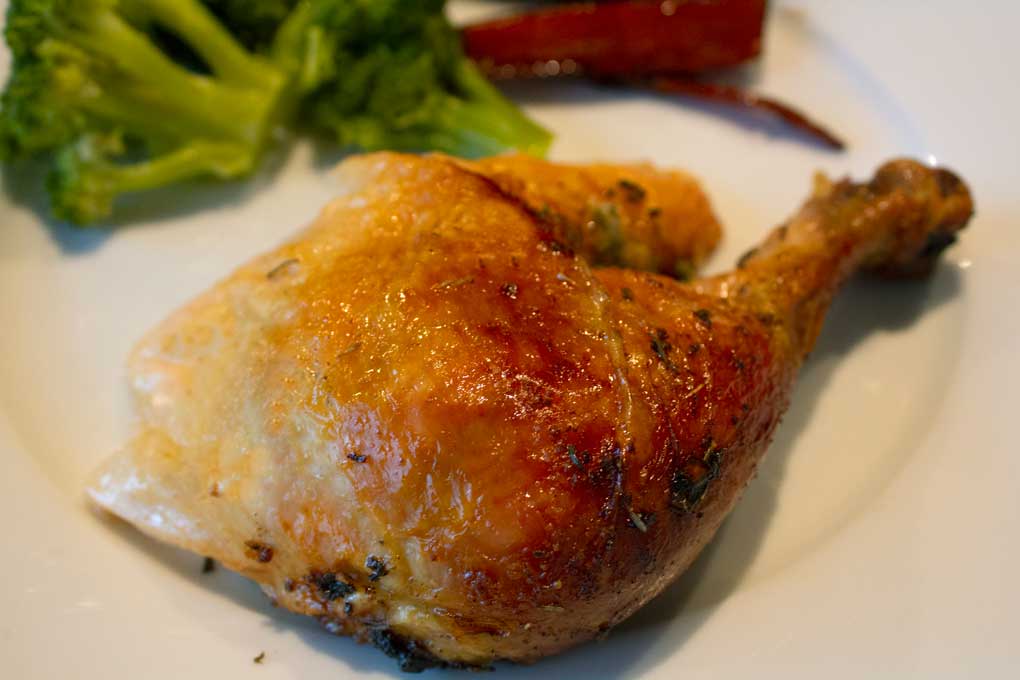 chicken leg quarter on plate