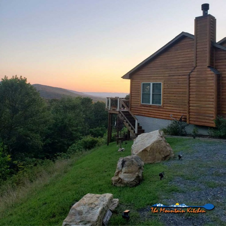 our home with sunset in distance