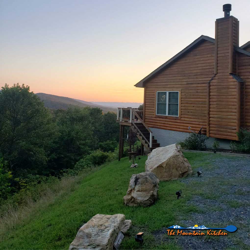 our home with sunset in distance