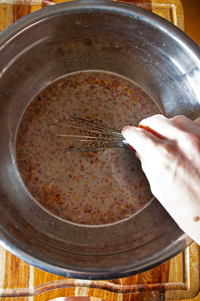 whisking brine solution with whisk