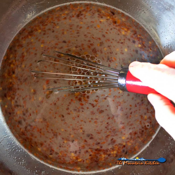 whisking pork and poultry brine