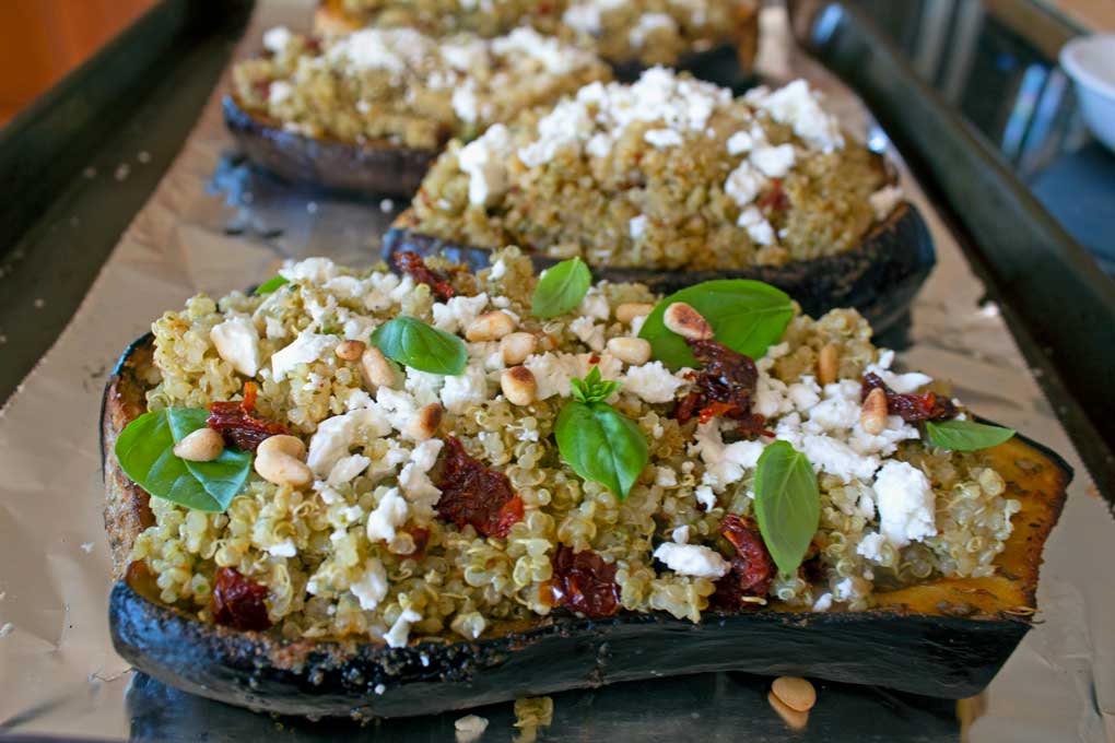 Mediterranean Quinoa-Stuffed Eggplant on baking sheet