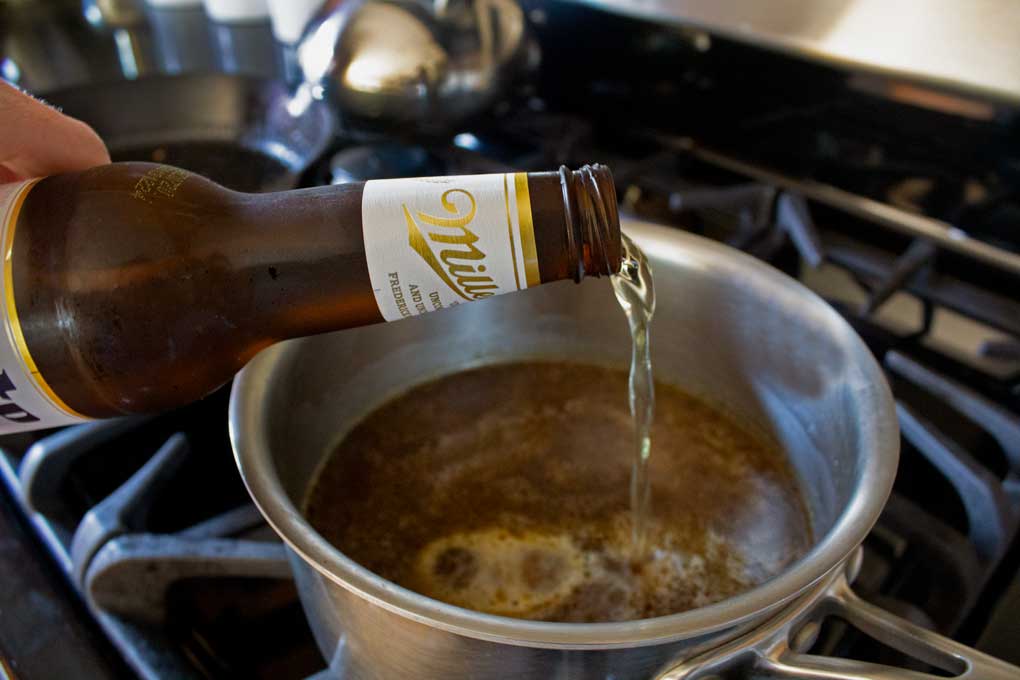 pouring beer in au jus