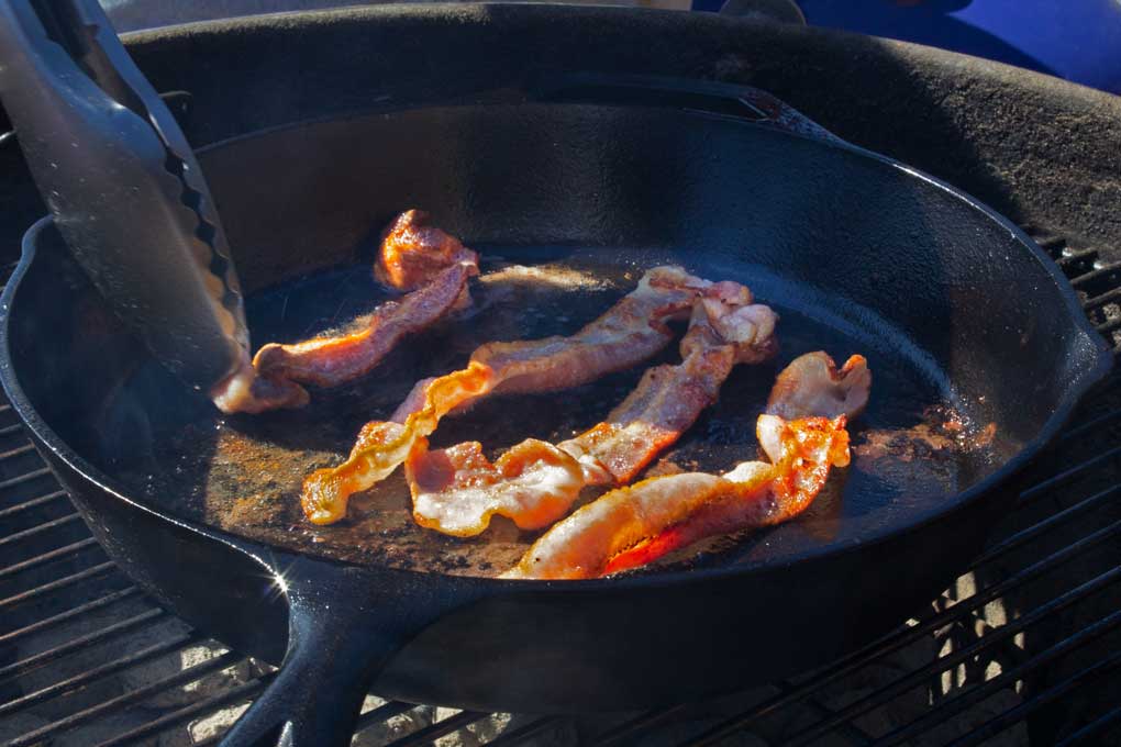 bacon cooking in pan