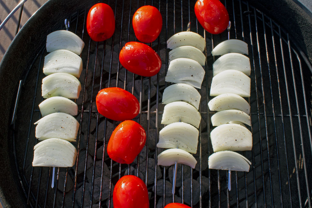 tomatoes and onions on grill