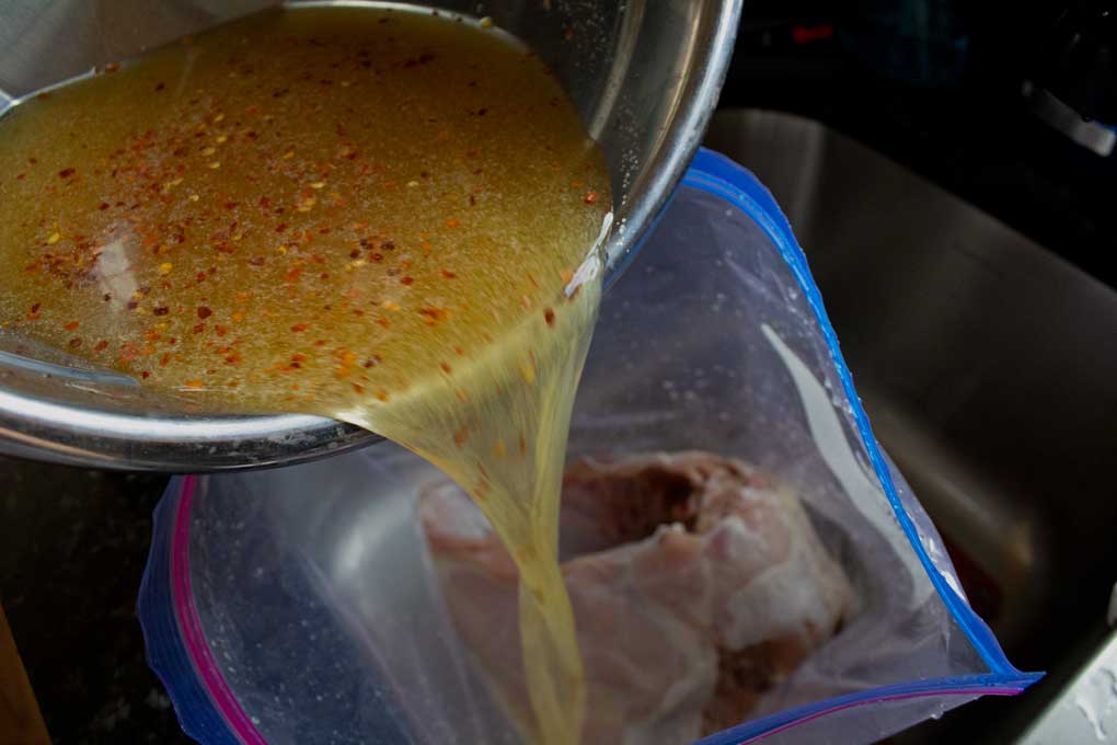 pouring brine into zip-top bag