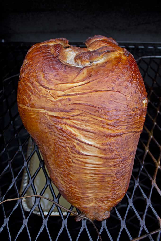 brined hickory-smoked turkey breast on smoker