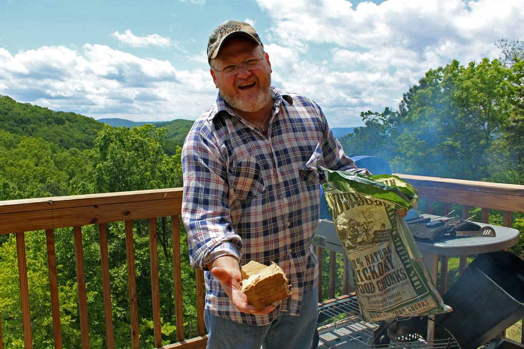 David holding hickory wood chunk