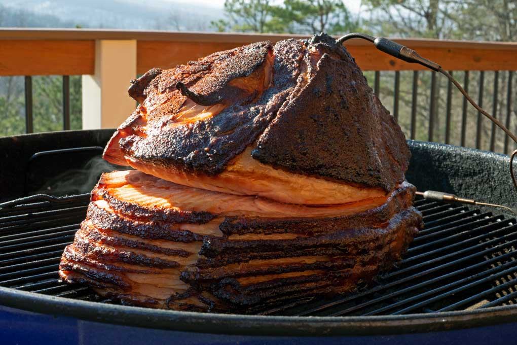 double-smoked ham smoking on grill