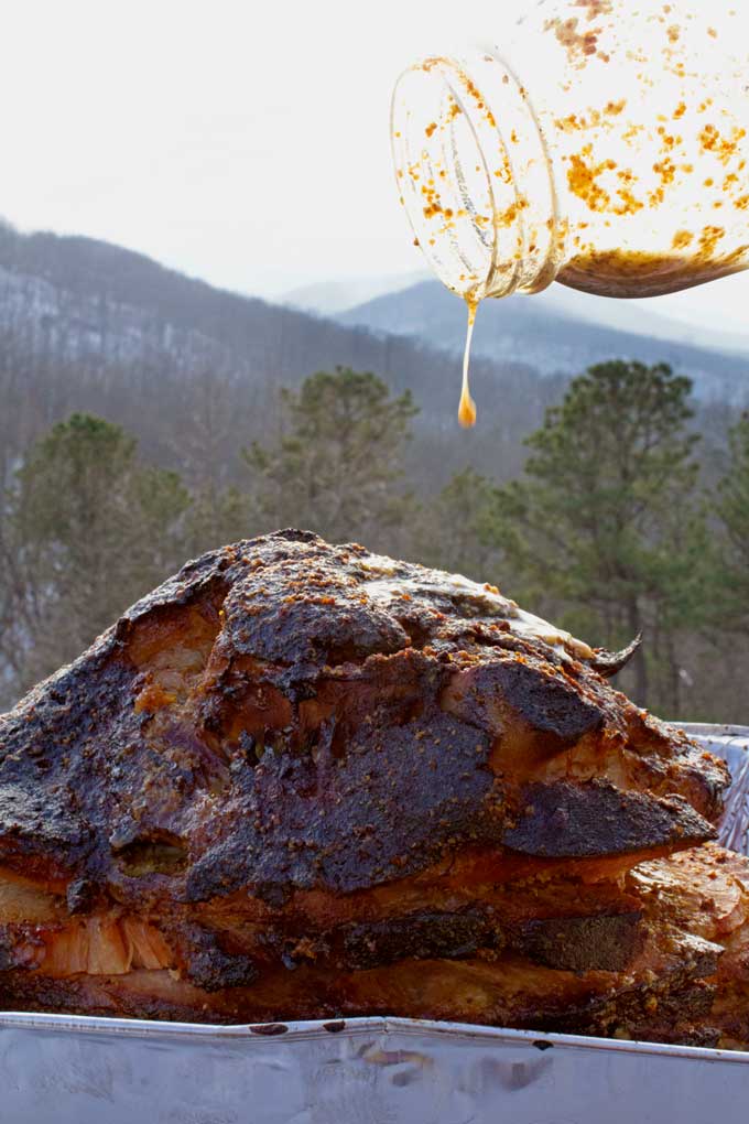 drizzling glaze over double smoked ham