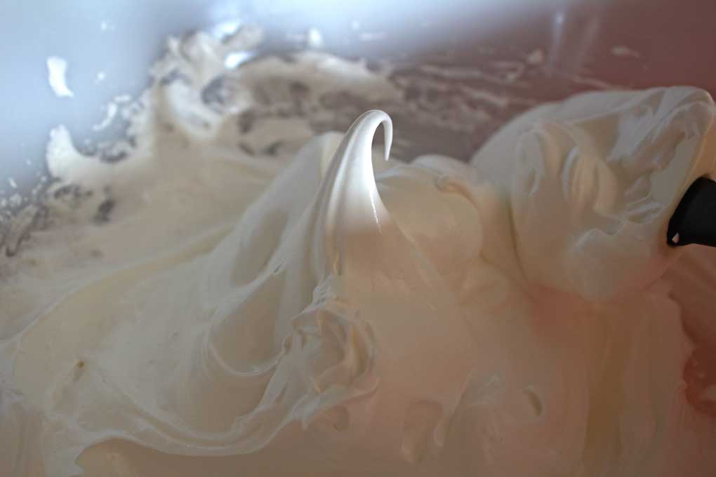 stiff peak of meringue in mixing bowl