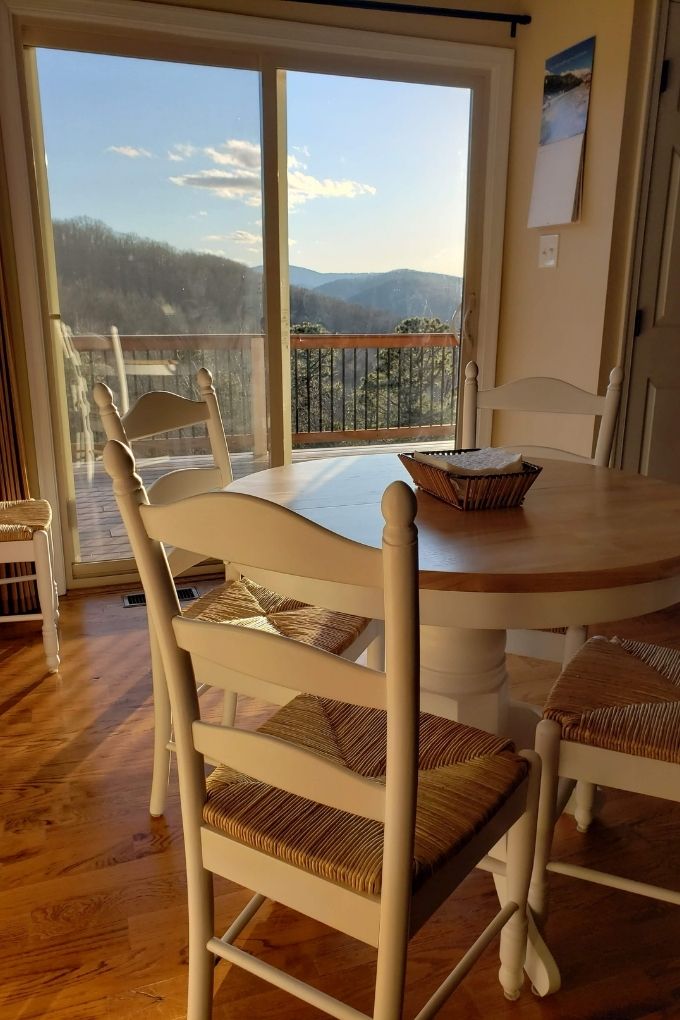 table and chairs with mountain view