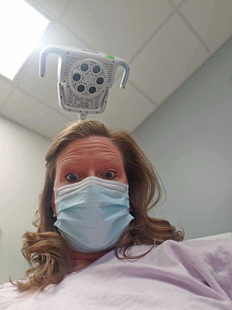 Debbie in dermatologist chair