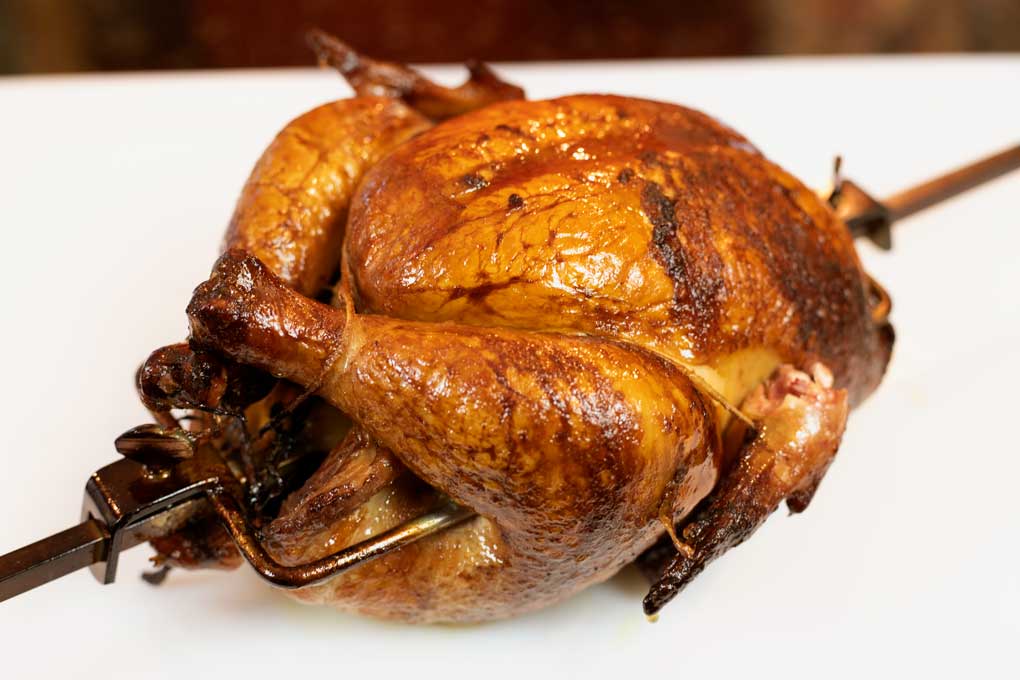 chicken resting on carving board