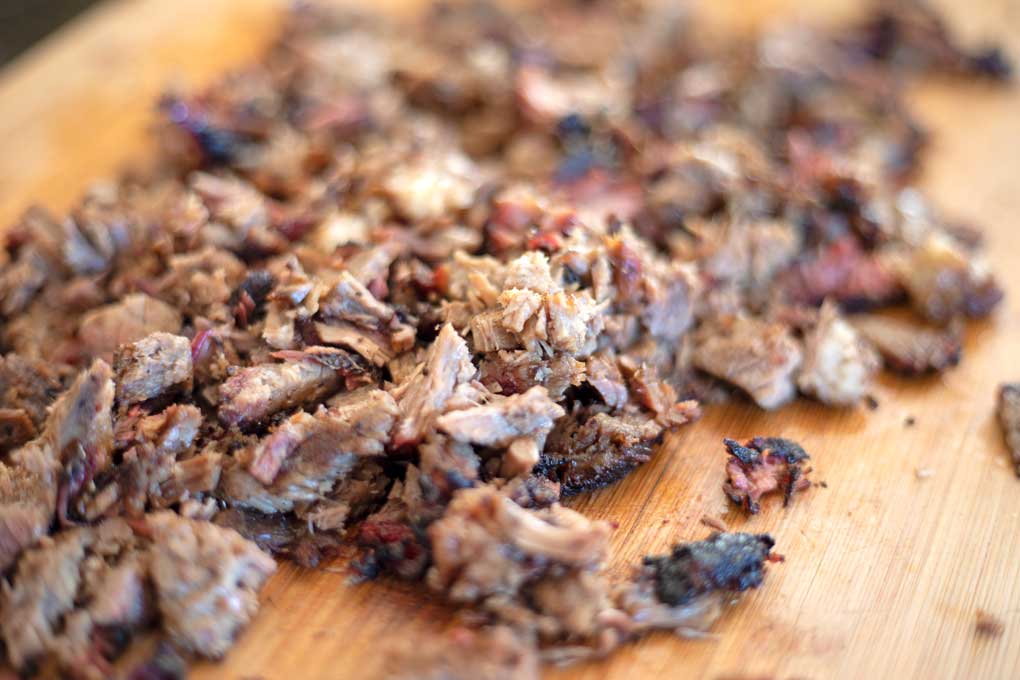 chopped brisket on cutting board