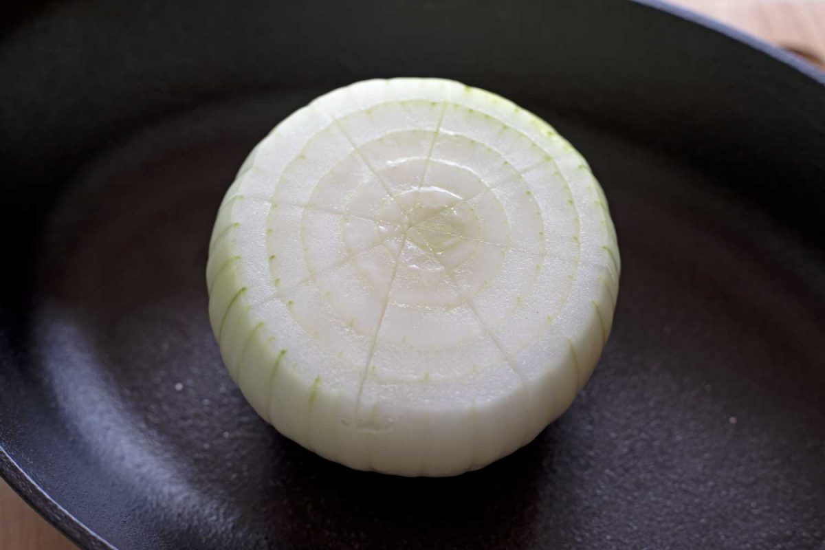 onion with crosshatch pattern cut into top