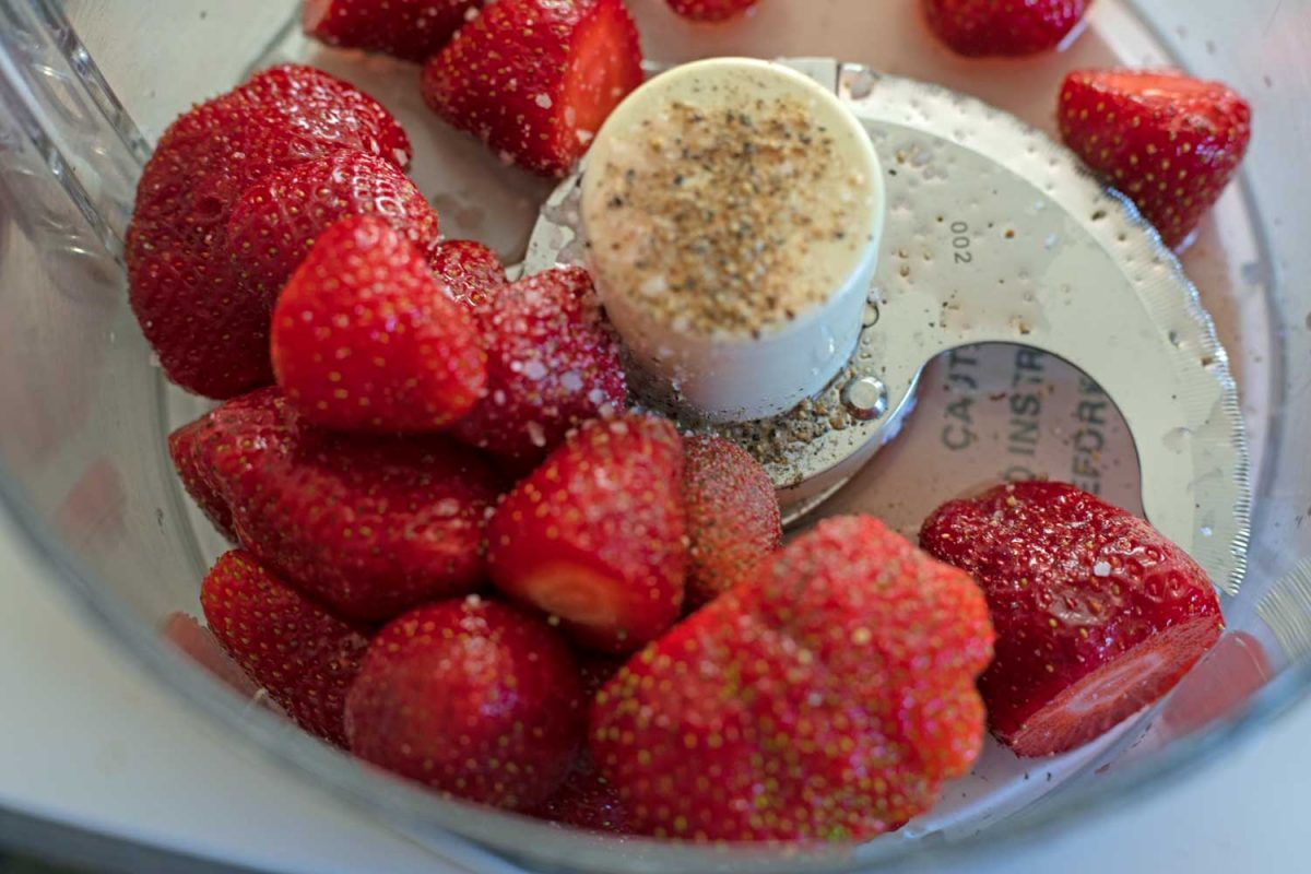 strawberries inside food processor bowl