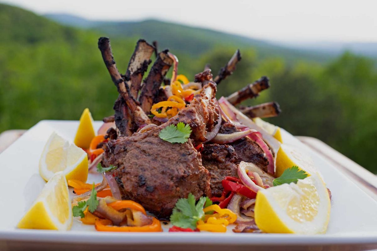 lamb chops on platter with mountain view