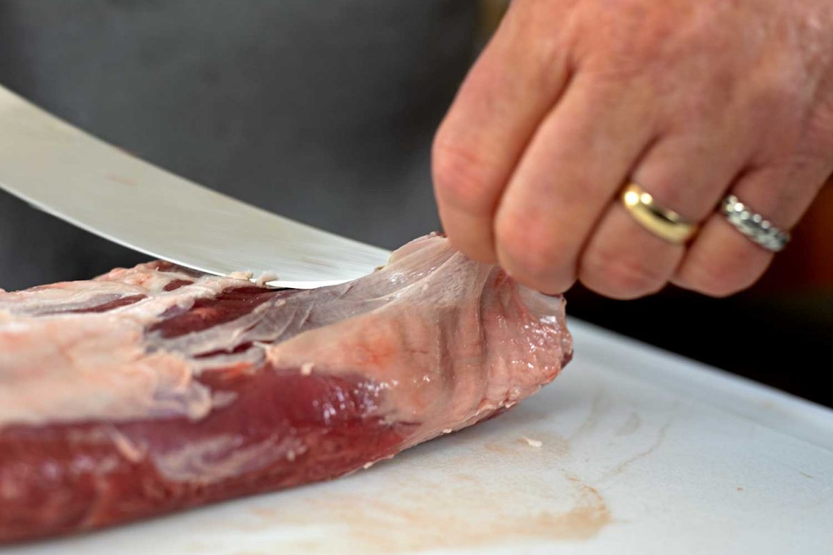 trimming silverskin from meat