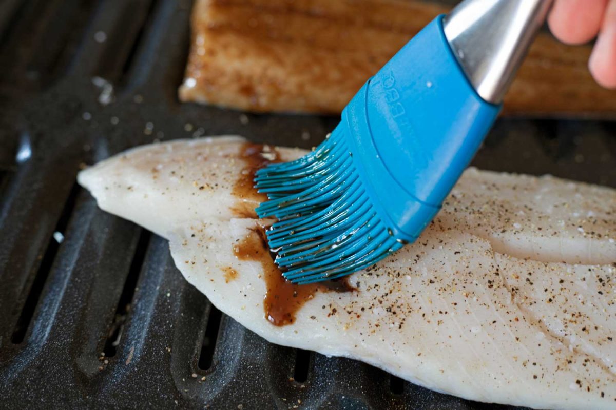 brushing cod with soy glaze