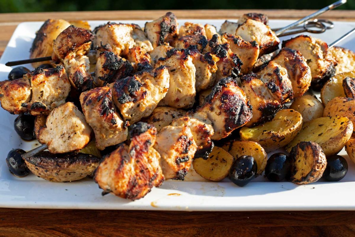 Greek Chicken Kabobs on platter ready to eat