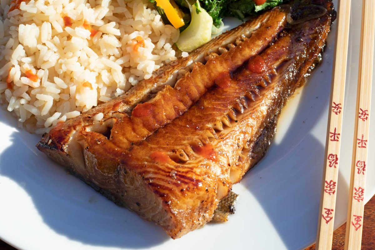 soy-glazed cod on plate with chop sticks, rice and bok choy