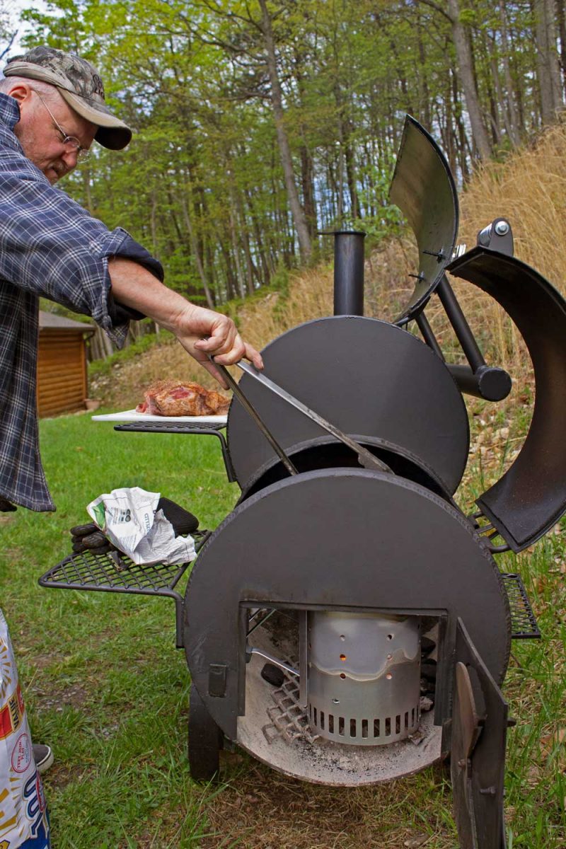 David tending to smoker