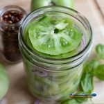 pickled green tomatoes in jar