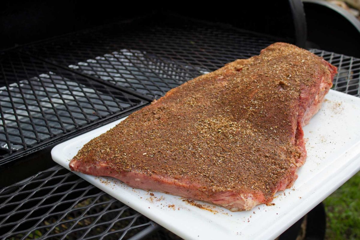 rubbed brisket ready for offset smoker