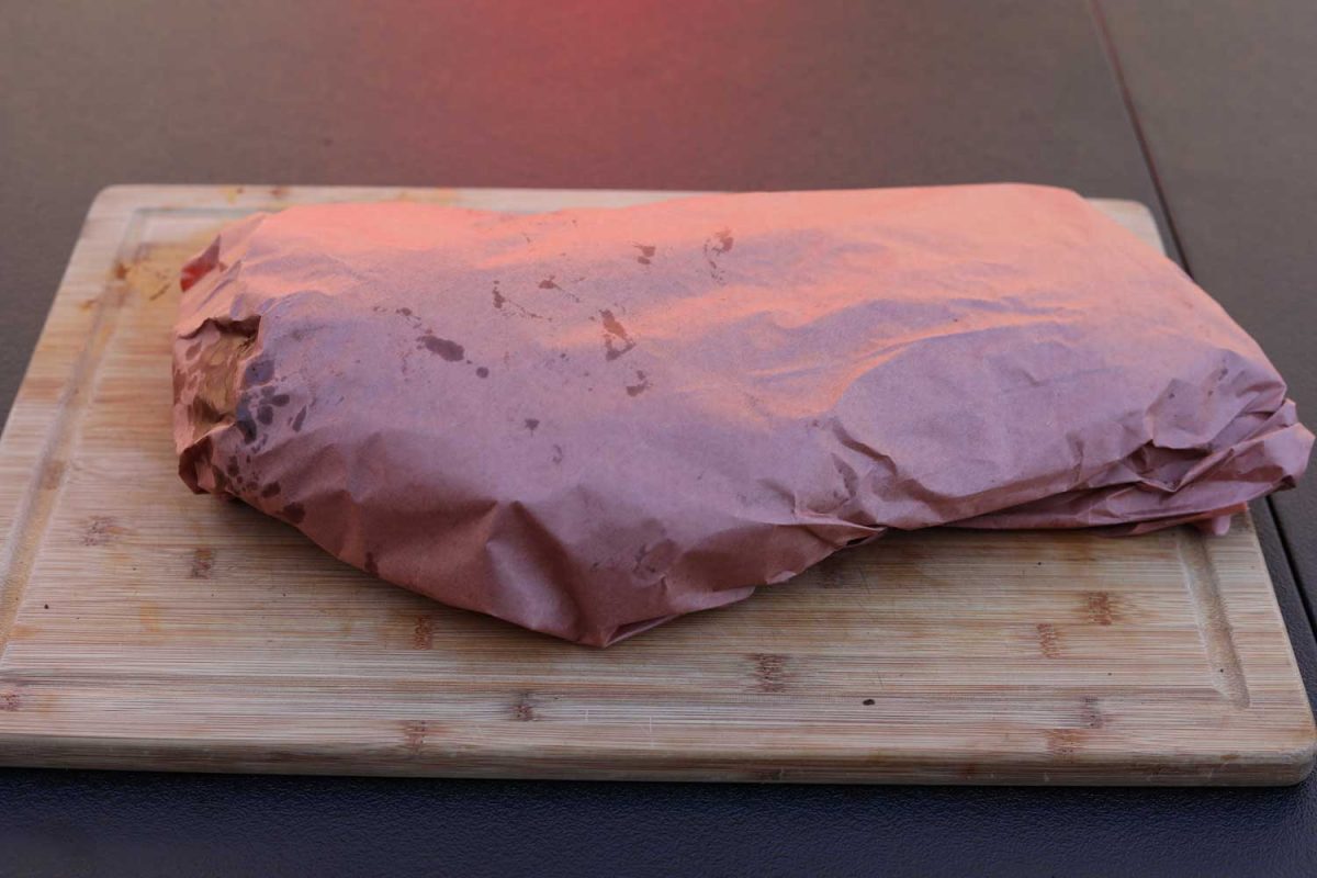 wrapped brisket in pink butcher paper