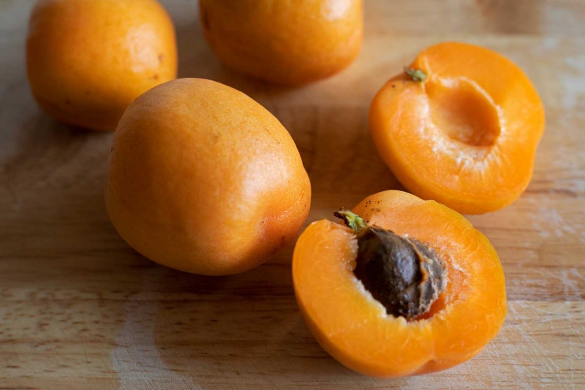 apricots on cutting board