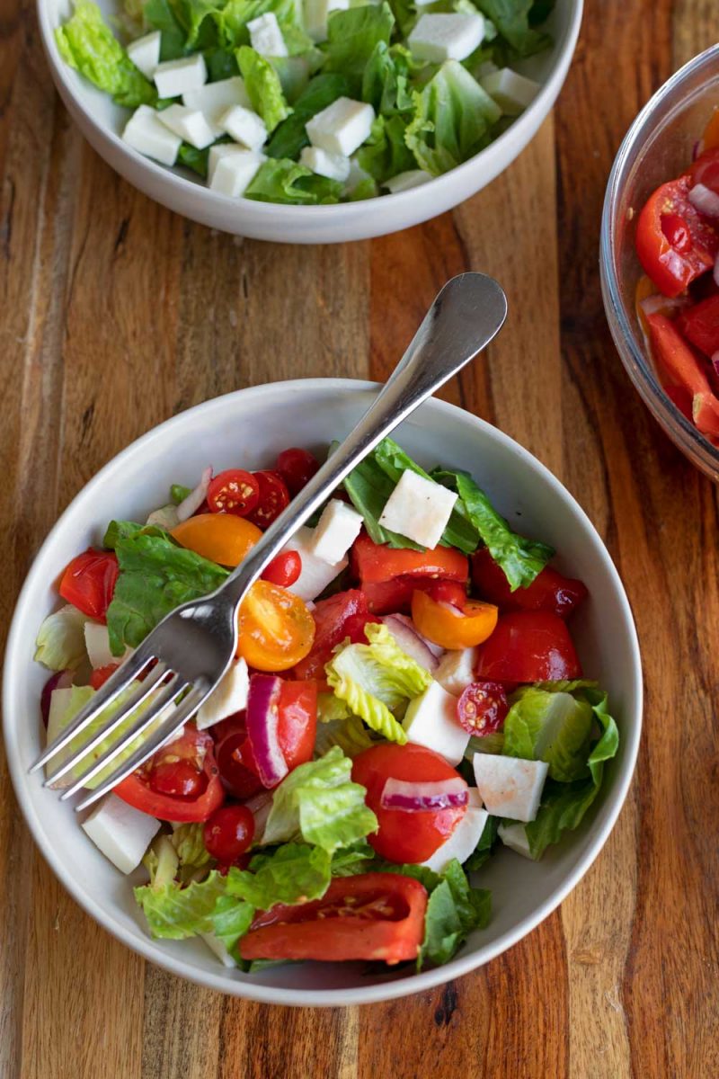 marinated tomato salad with fork