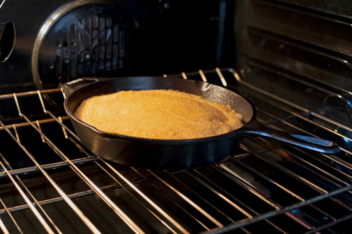skillet cake baking inside oven