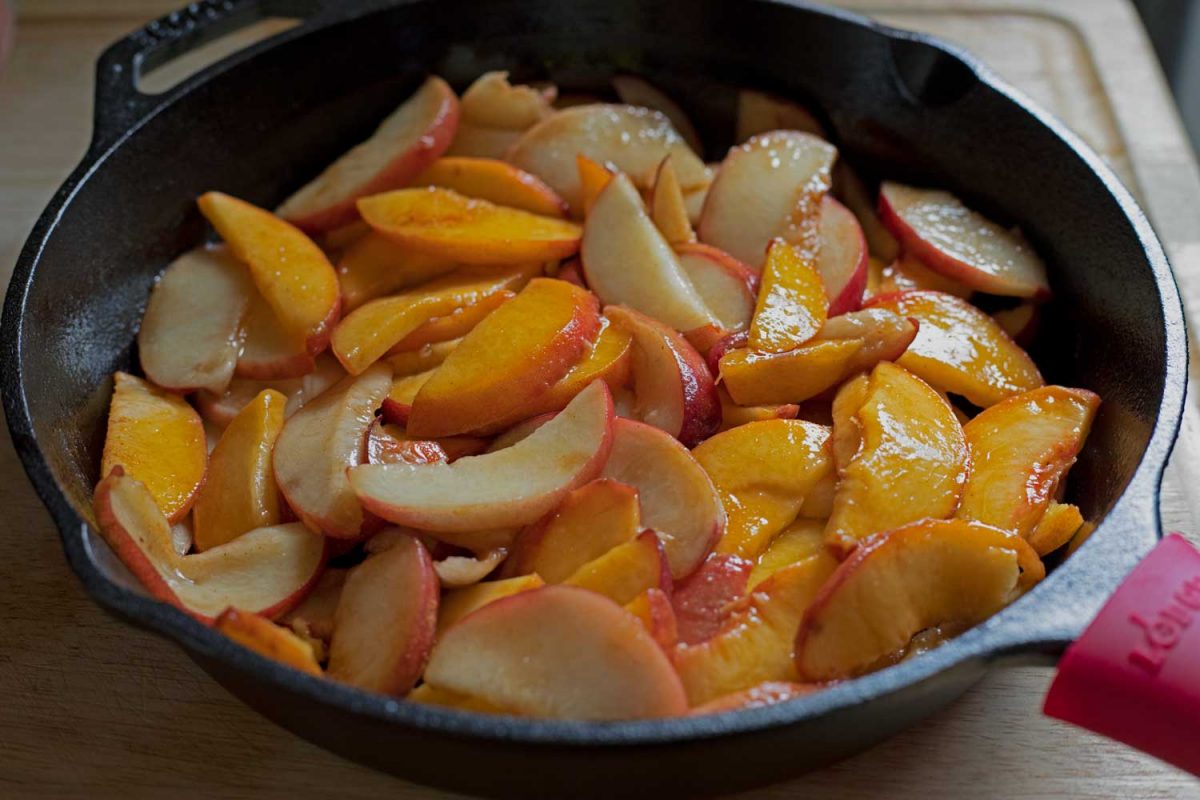 peaches inside cast-iron skillet