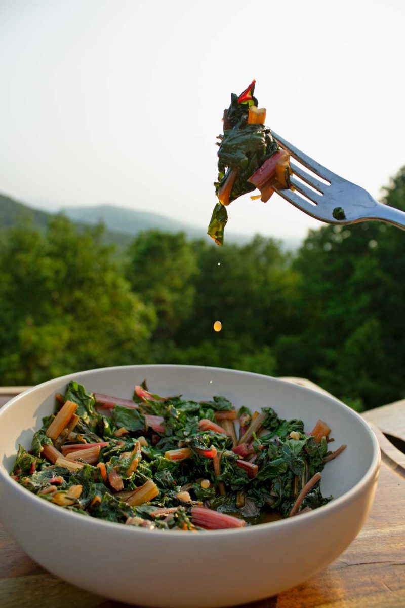 Easy Swiss Chard in bowl with a bite on fork
