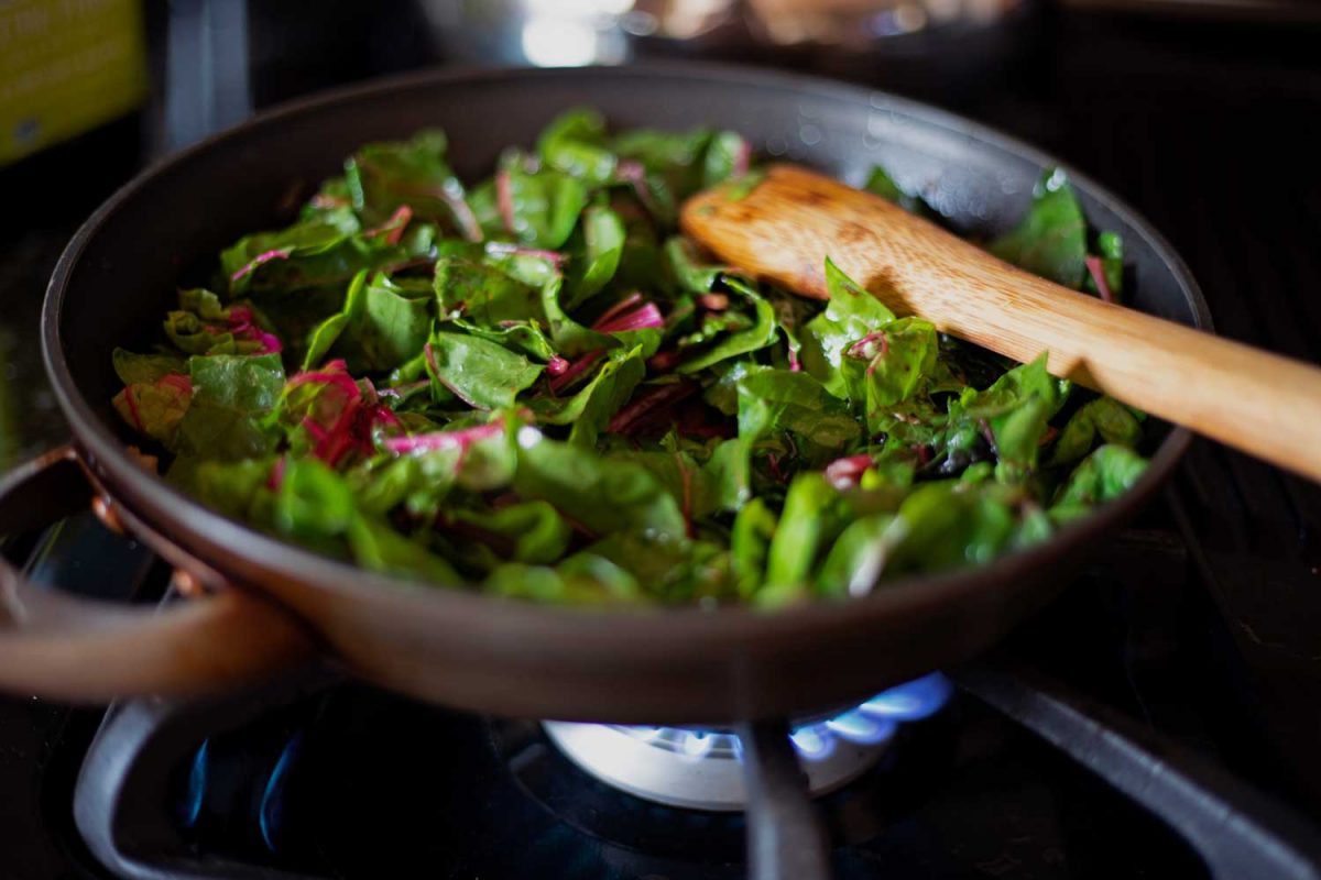 chard leaves in skillet