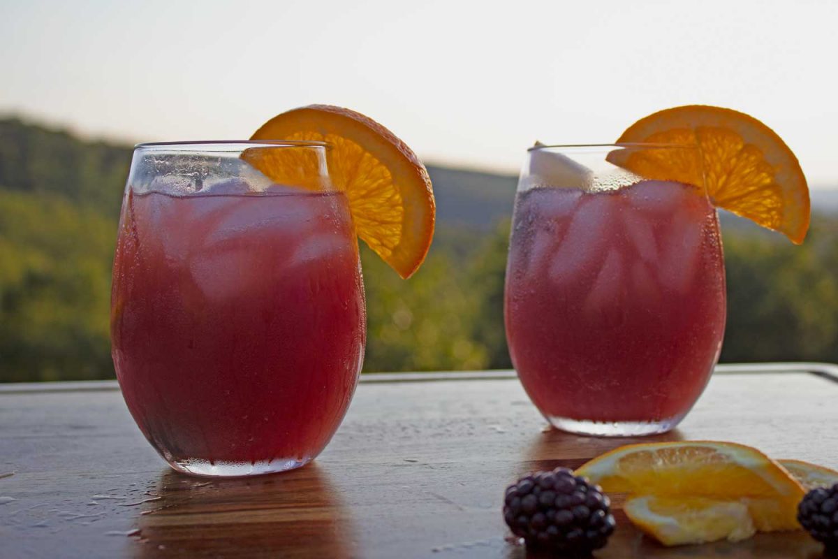 two glasses of sangria with mountain view