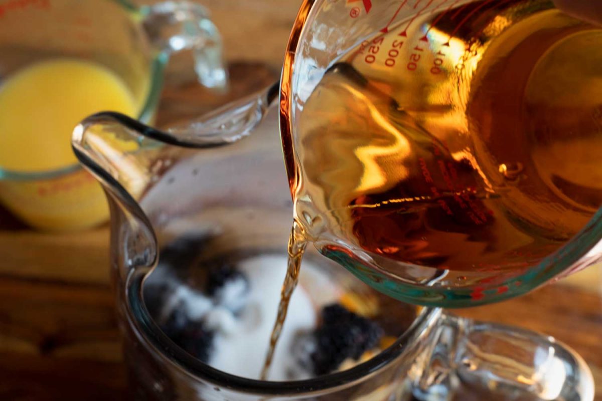 brandy pouring into pitcher