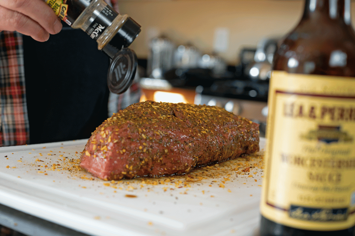 sprinkling meat with dry rub