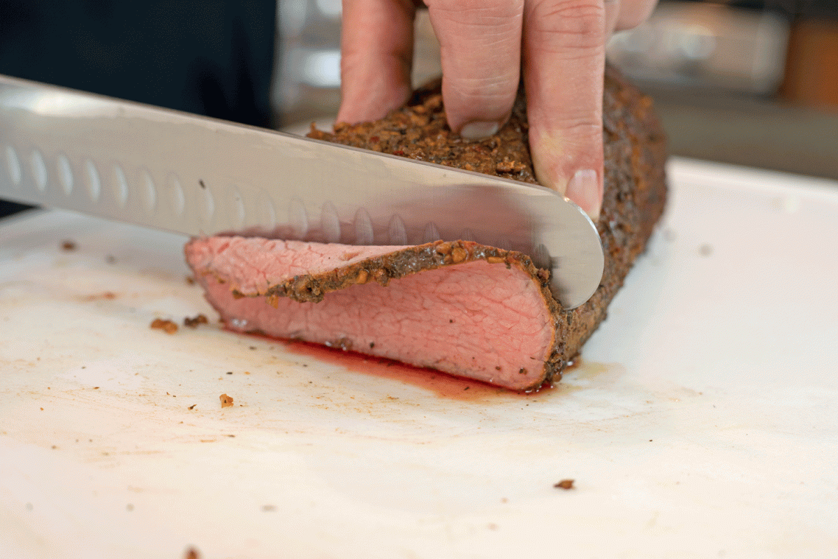 slicing smoked eye of round roast