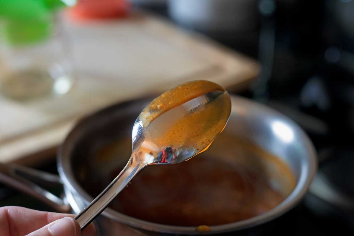 separated sauce on back of spoon